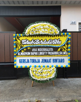 Papan Bunga Duka di Pija